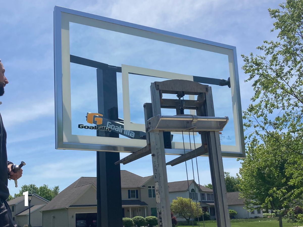 lift holding basketball backboard on a lift.