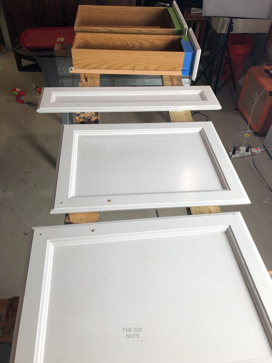 painting cabinet doors on 2 x 4's and sawhorses