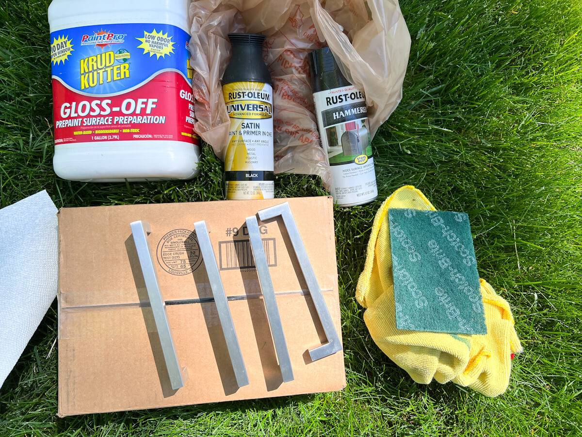 supplies used to paint hardware handles for cabinets.