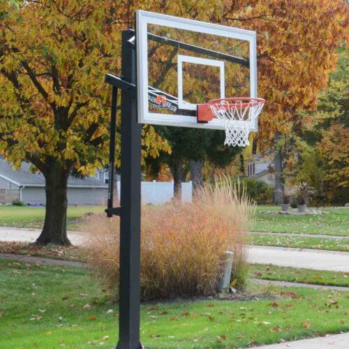 in-ground basketball goal on the side of the driveway.