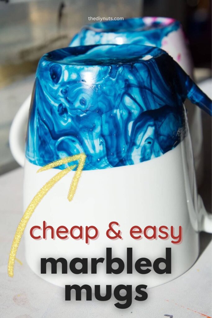 white ceramic mug with blue swirl designs with arrow and text cheap and easy marbled mugs.