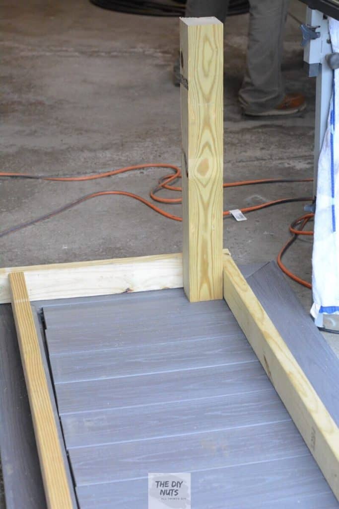 Create the beginning frame out of pressure treated wood and place on top of composite decking