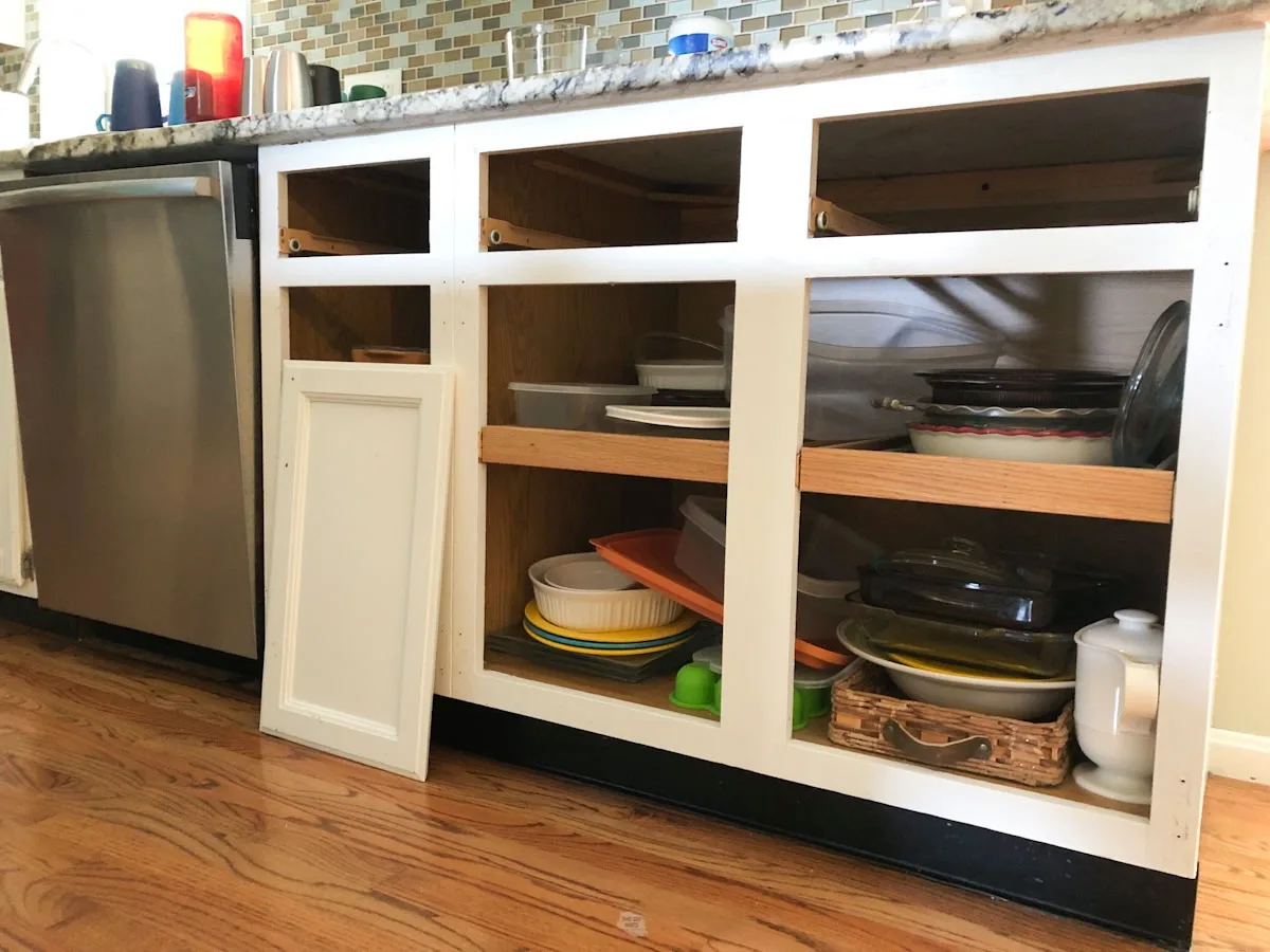 lower cabinets with doors taken off.