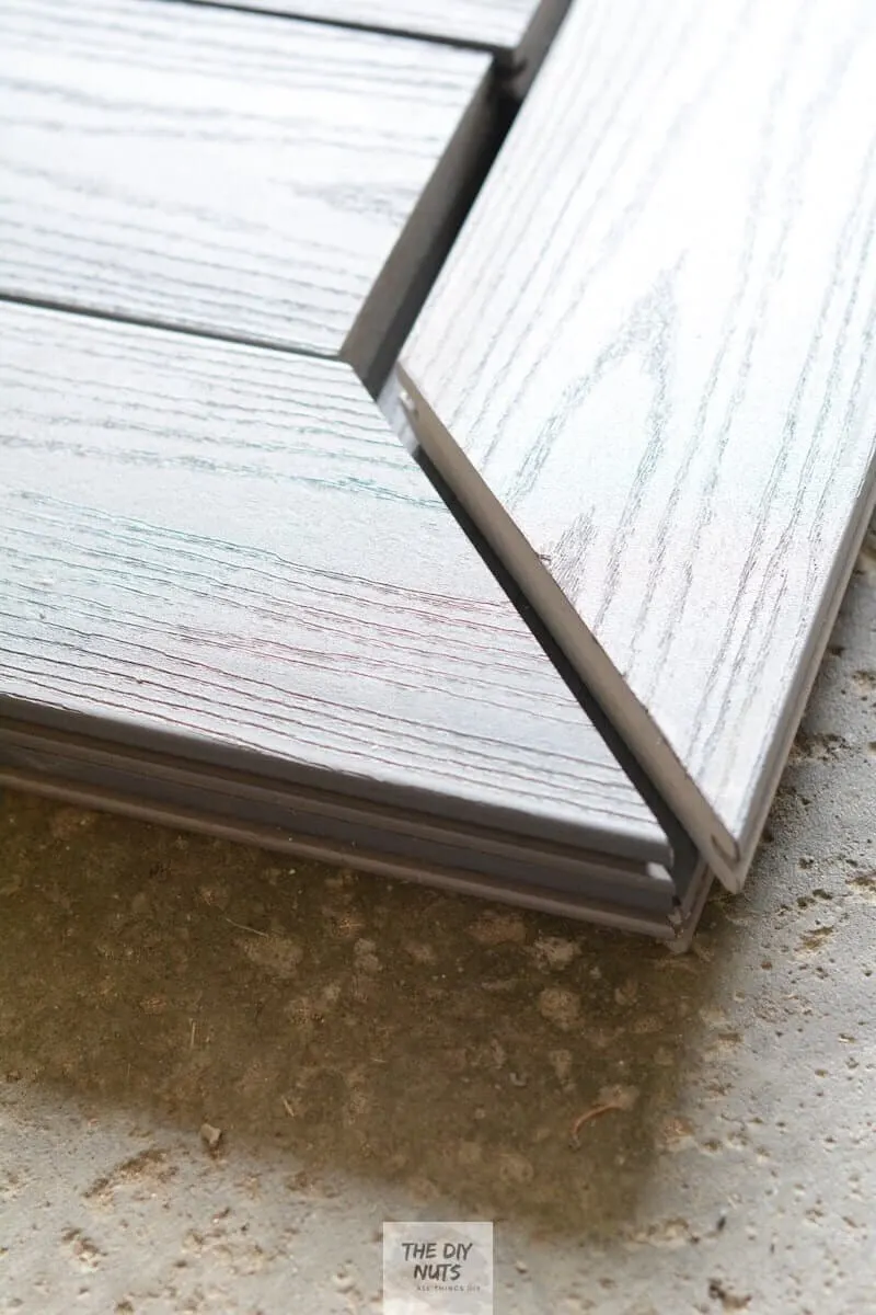 Mitered gray composite decking used to create DIY outdoor table